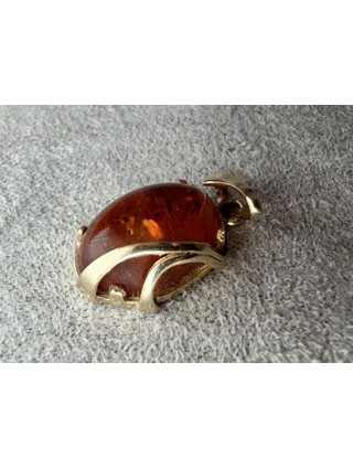 Złota zawieszka z bursztynem pr.585 1.97g