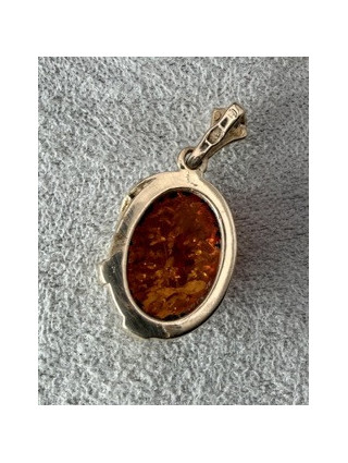 Złota zawieszka z bursztynem pr.585 1.97g